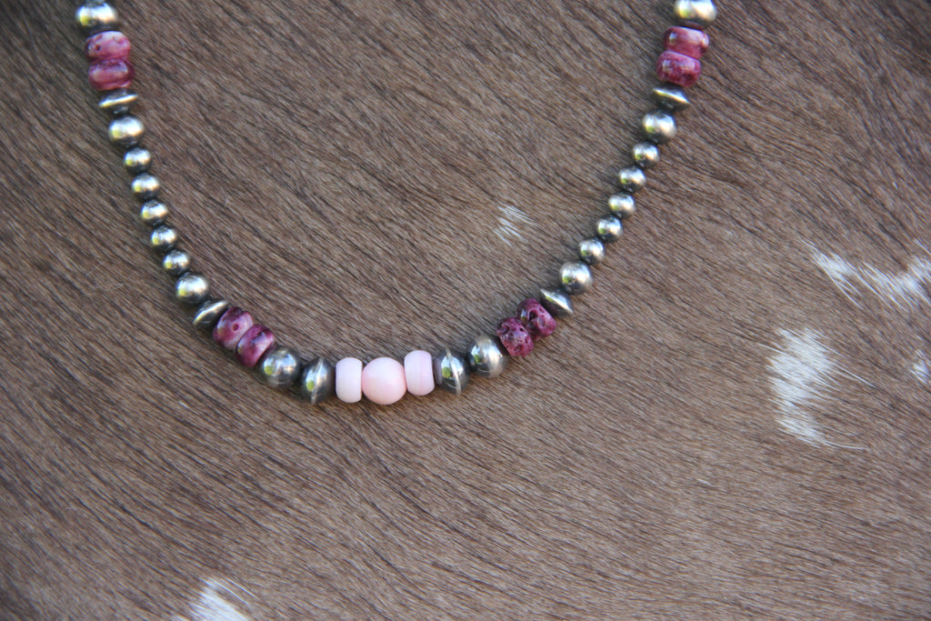 Pink conch and purple spiny oyster necklace, sterling silver bead detail
