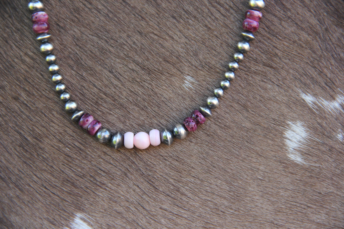  Pink conch and purple spiny oyster necklace, sterling silver bead detail