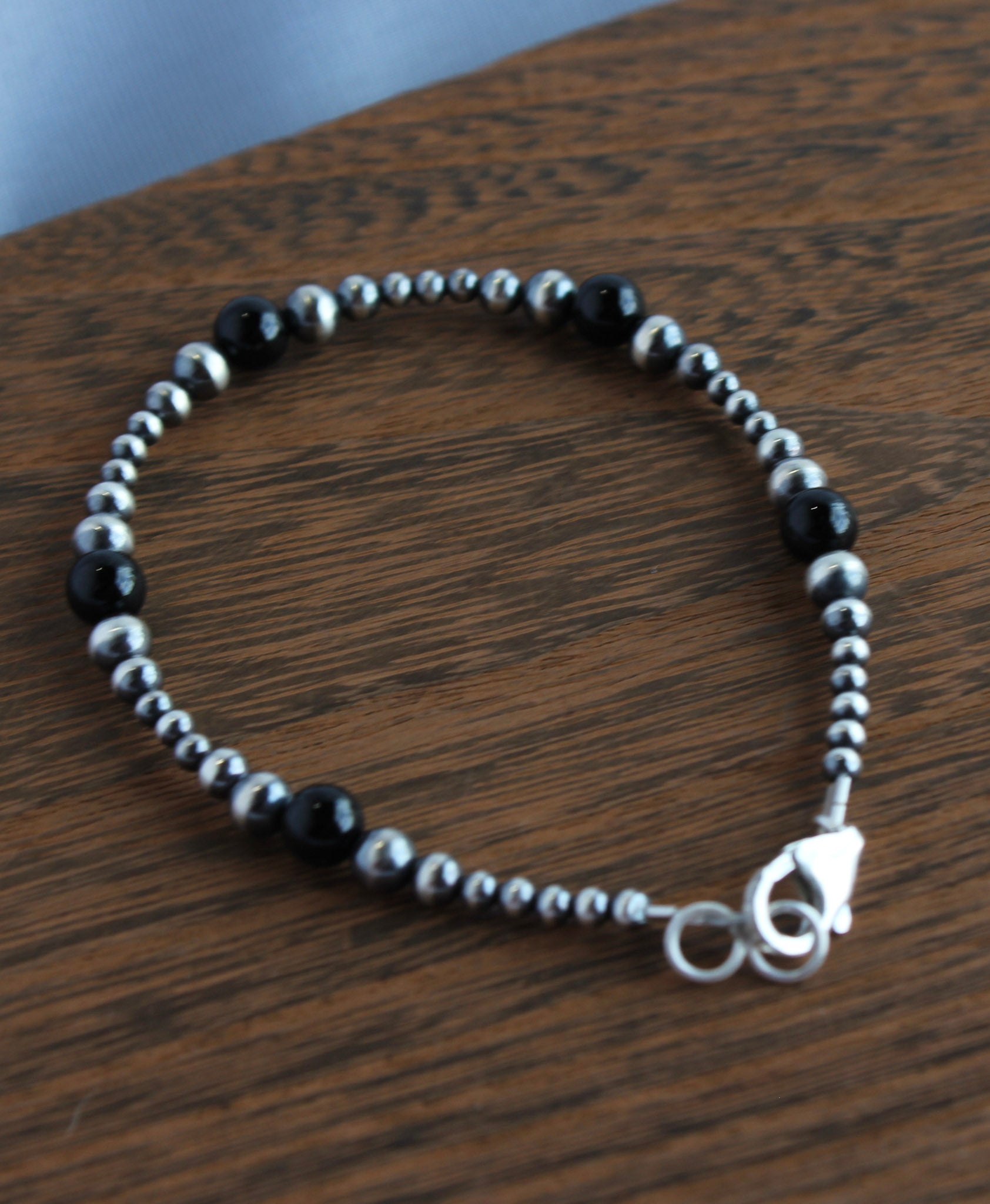 7" Graduated Black Onyx and 925 Sterling Silver Round Beads Bracelet